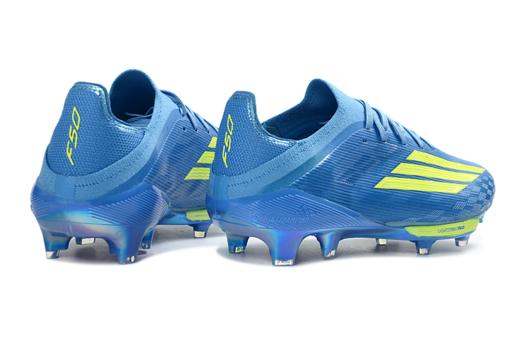 Detail of Adidas F50+ Elite FG football shoe, featuring the iconic Adidas three-stripe design and premium materials.