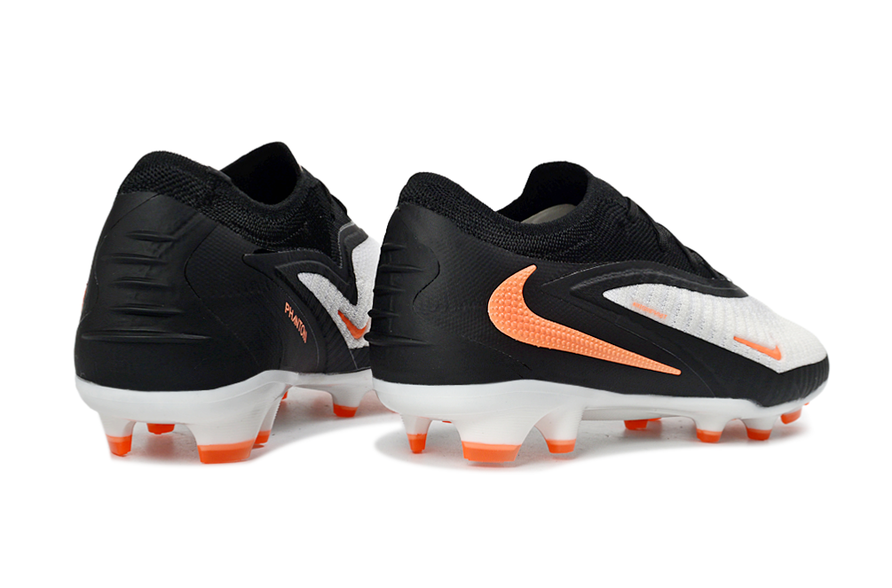 Nike Phantom 6 Elite FG football boot with player wearing it, demonstrating its performance